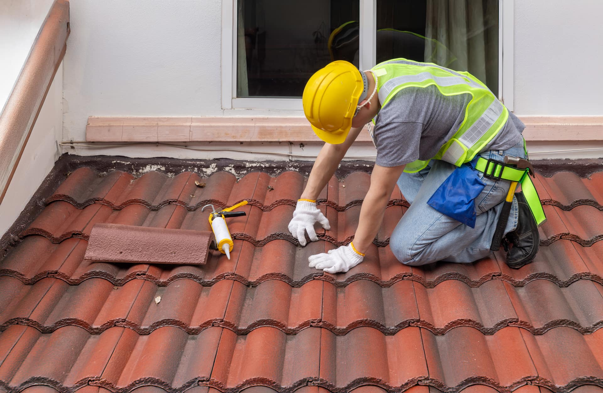 Roofcraft roofer installing a new tiled roof in Hertfordshire